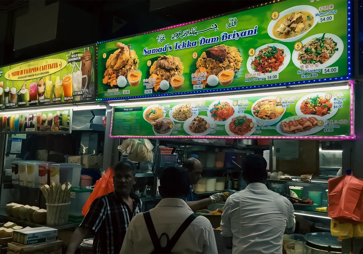 Busy night market food stall with illuminated menu boards displaying diverse Asian street food dishes, as customers order freshly prepared meals in a vibrant urban setting.